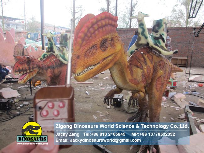 Children's coin operated games fair dilophosaurus rides DWE042